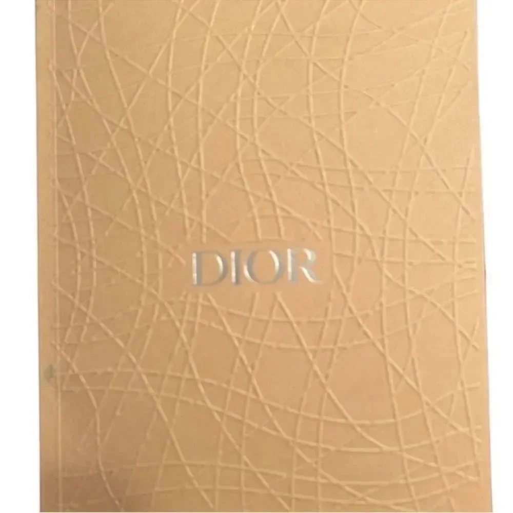 Christian Dior Tan Unlined Notebook.